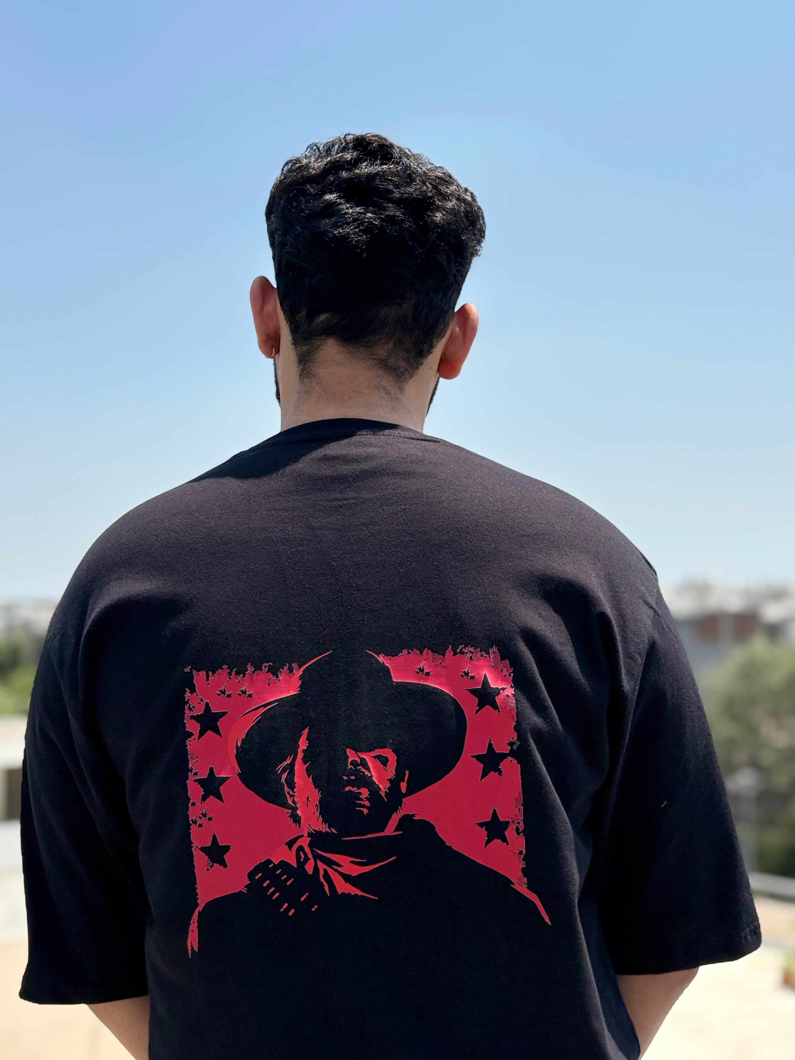 Red cowboy graphic printed on the back of the Blood Moon Cowboy oversized T-shirt