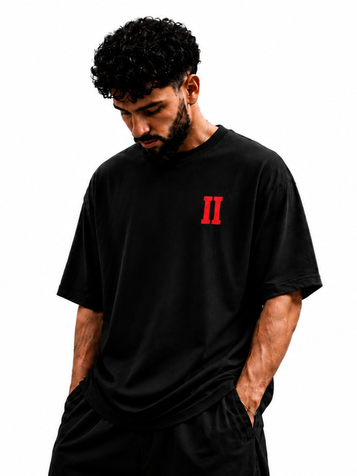 Model wearing Blood Moon Cowboy oversized graphic T-shirt in black by V-Era Haus