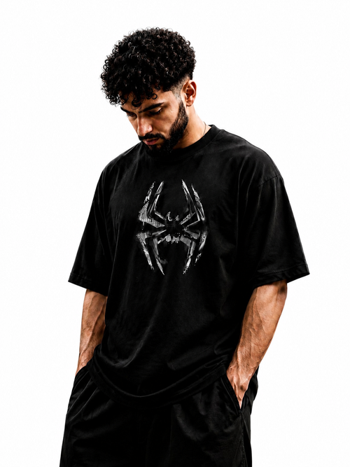 Model wearing Eclipse Spider oversized graphic T-shirt in black by V-Era Haus