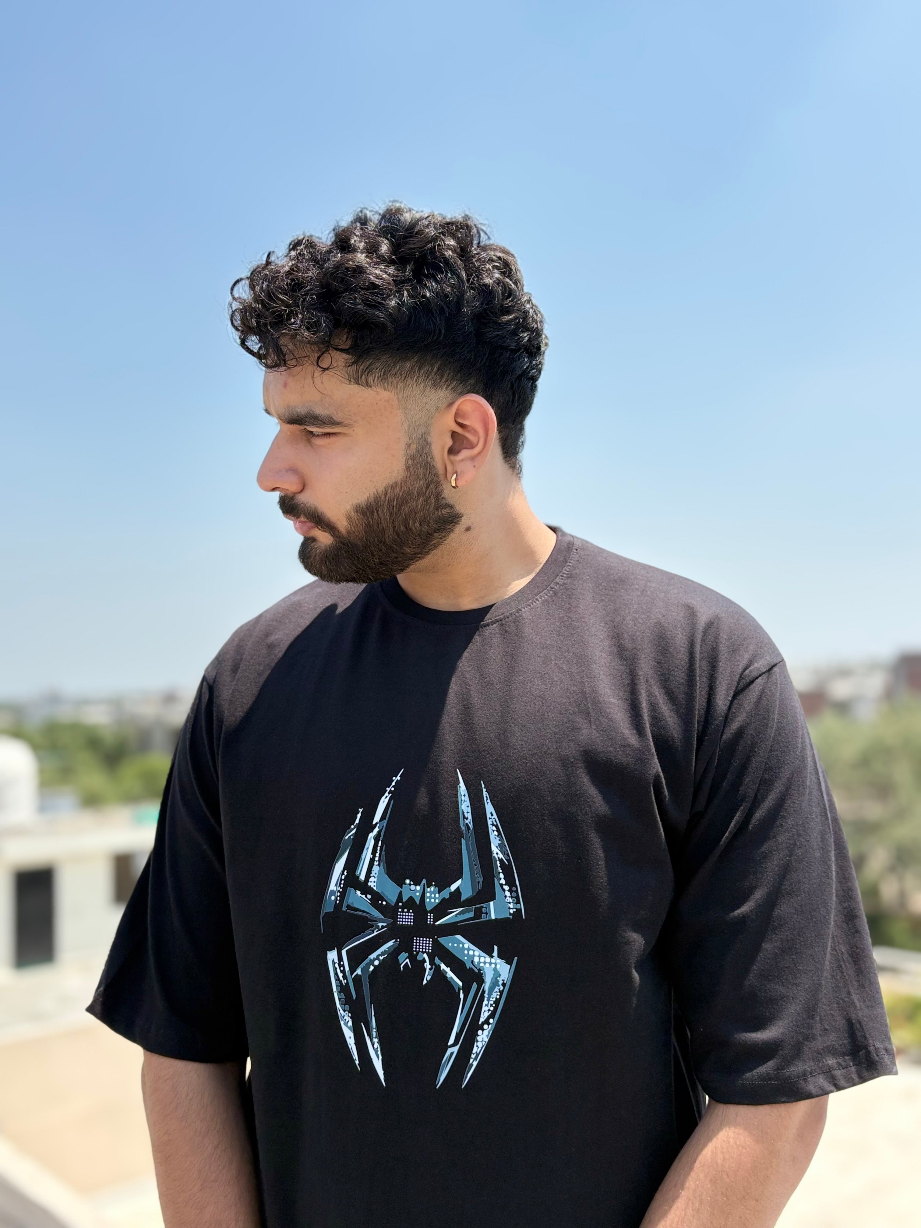 Front view of Eclipse Spider oversized graphic T-shirt on model