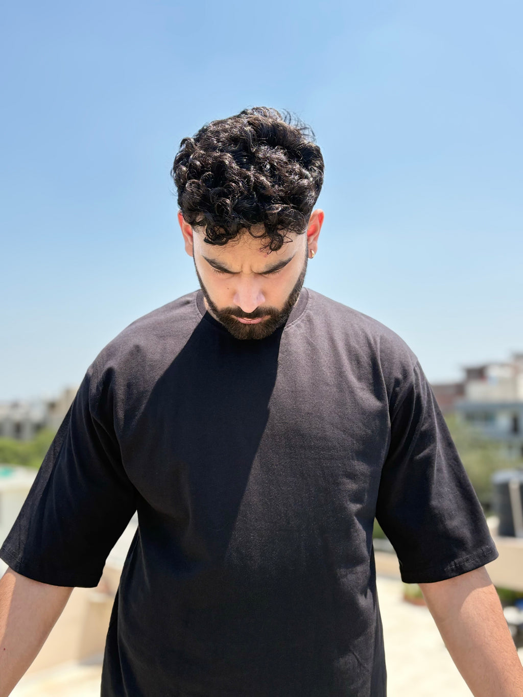 Front view of The Artist Within oversized graphic T-shirt in black