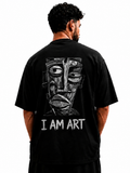 Model wearing The Artist Within oversized graphic T-shirt by V-Era Haus